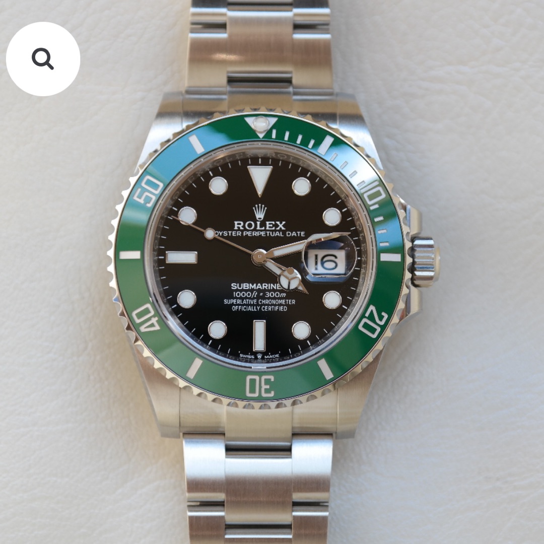 PRE-OWNED ROLEX SUBMARINER
