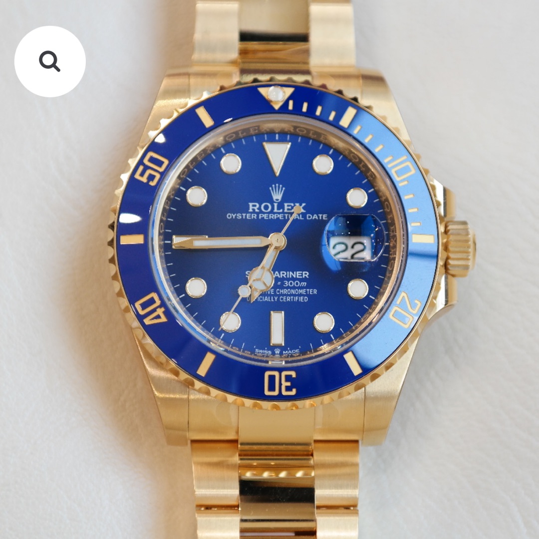 PRE-OWNED ROLEX SUBMARINER