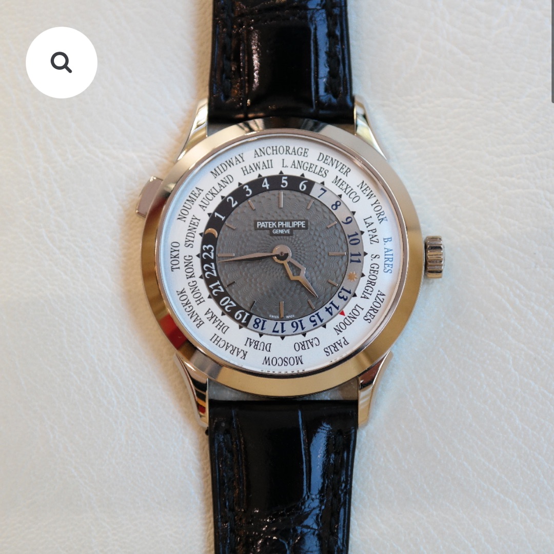 PRE-OWNED PATEK PHILIPPE WORLD TIME