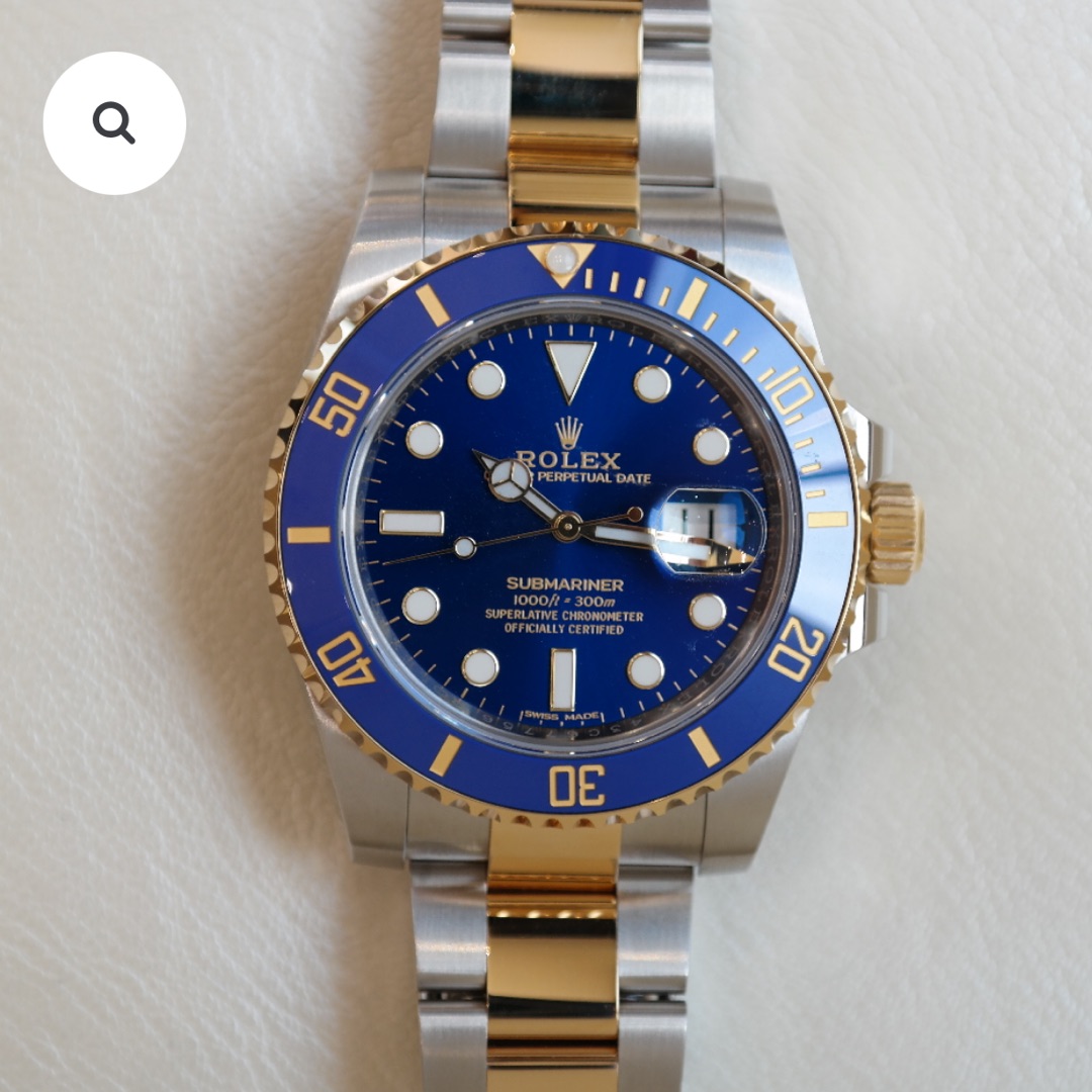 PRE-OWNED ROLEX SUBMARINER DATE