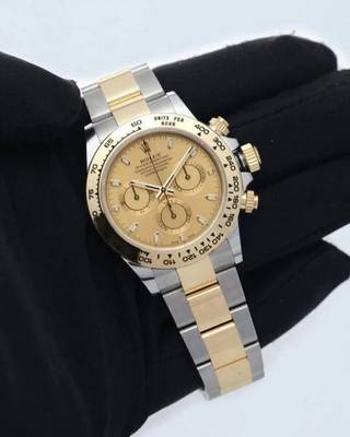 Rolex Cosmograph Daytonain Oystersteel & Yellow Gold 