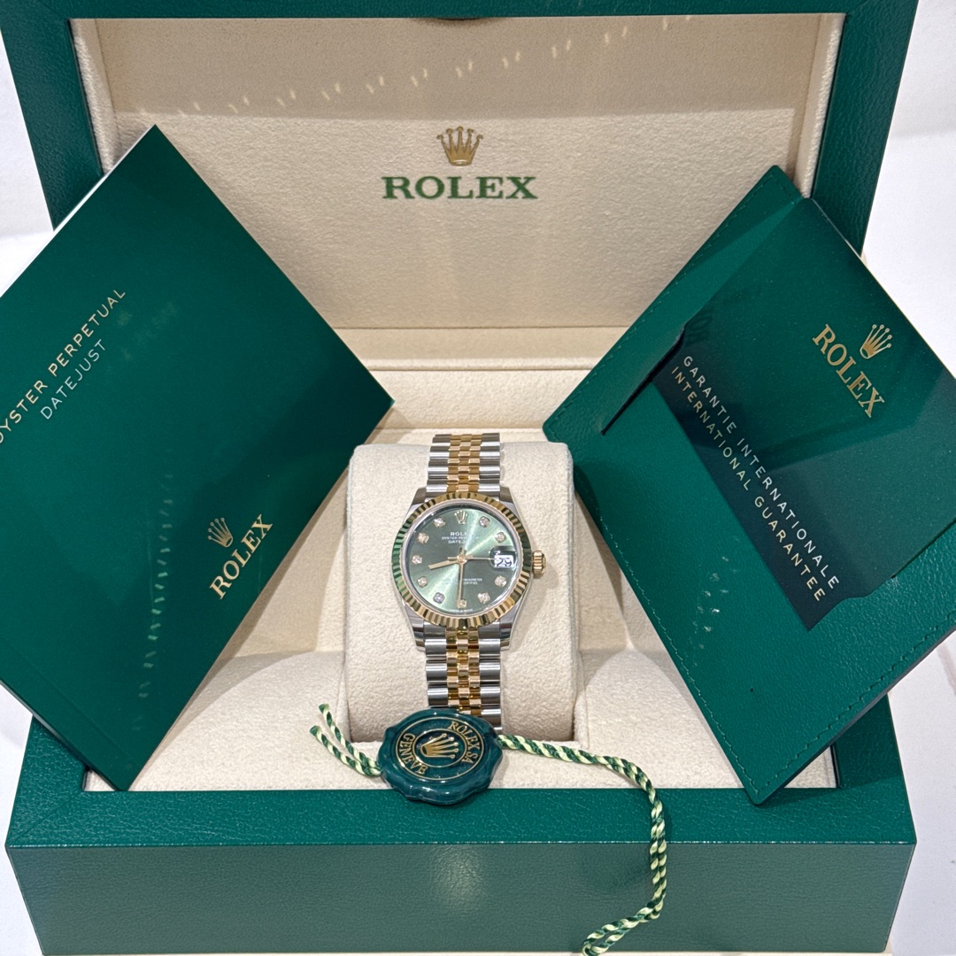 Rolex 31mm green diamond dial