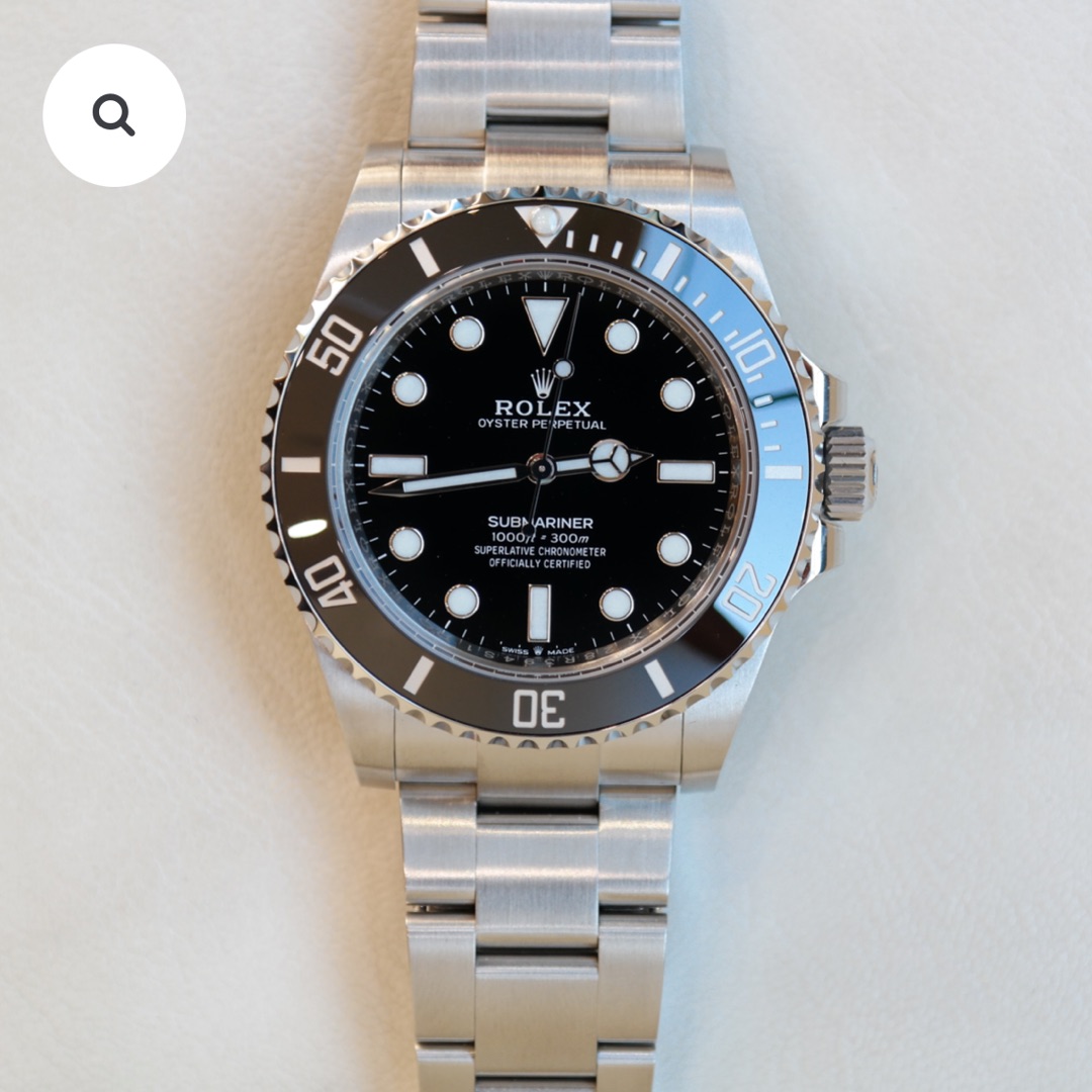 PRE-OWNED ROLEX SUBMARINER