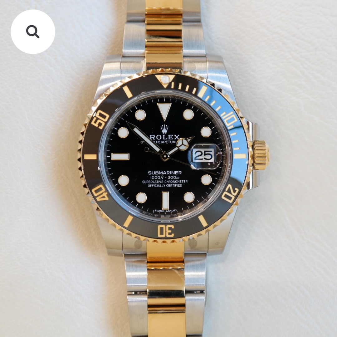 PRE-OWNED ROLEX SUBMARINER DATE