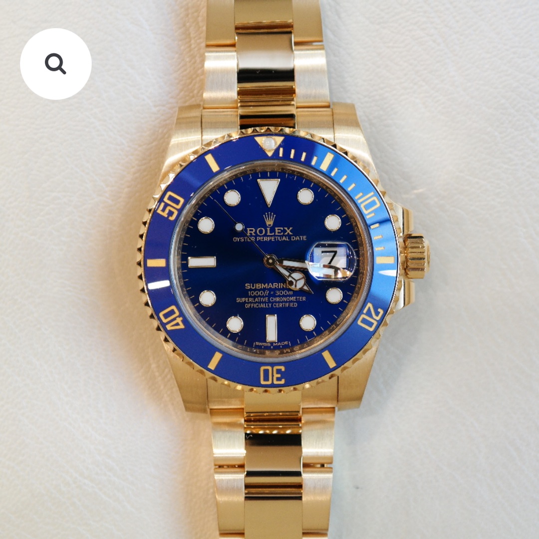 PRE-OWNED ROLEX SUBMARINER