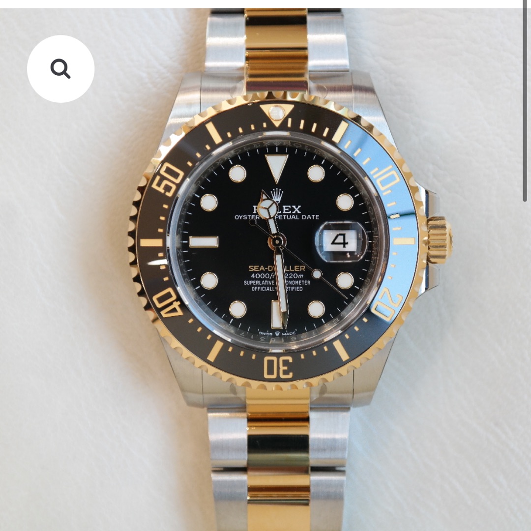 PRE-OWNED ROLEX SUBMARINER