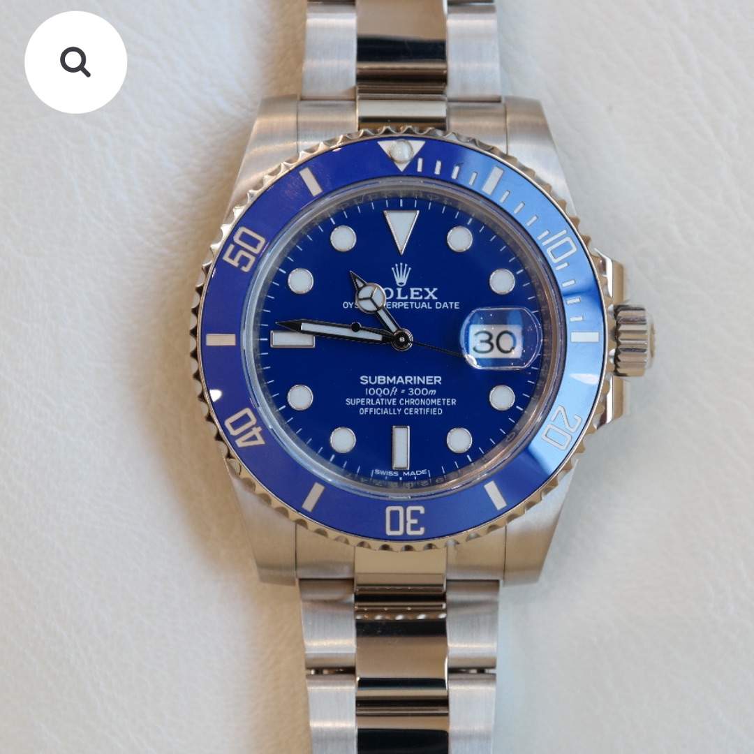 PRE-OWNED ROLEX SUBMARINER DATE