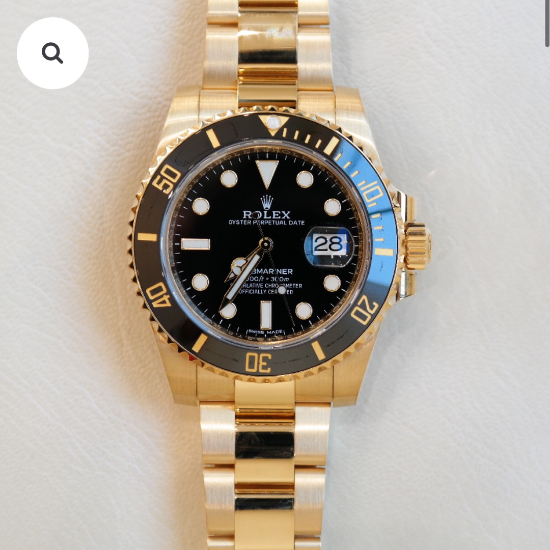 PRE-OWNED ROLEX SUBMARINER